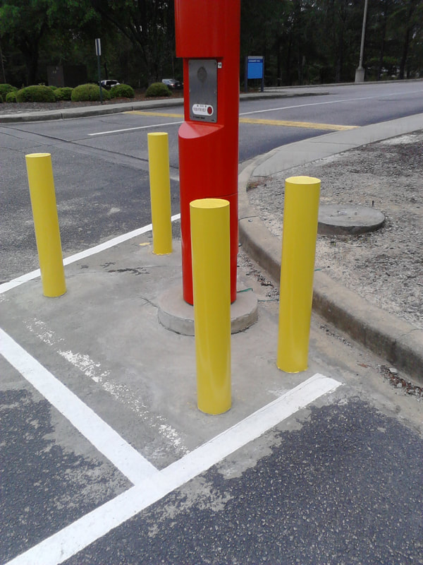 Emergency Call Box and Safety Bollards Paint After Photo